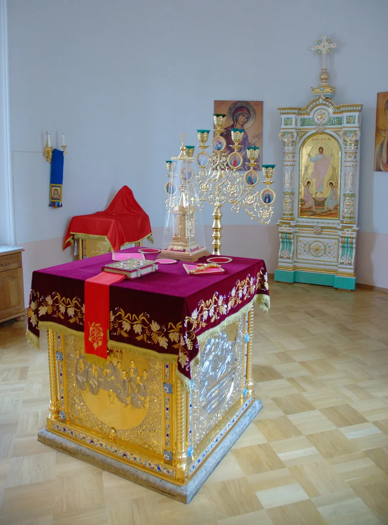 The lamp-stand with seven lights standing behind the altar table. Valaam Monastery, Karelia