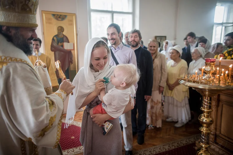 Kissing the cross at the end of the service: the cross, the Gospel and an icon are all venerated the same way