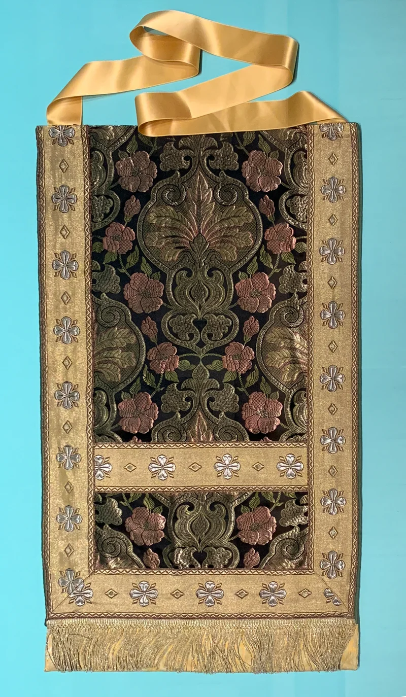 A rectangular cloth on the long ribbon that passes over the shoulder. Hermitage Museum