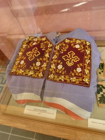 The tablets of a bishop's mantle close up: gold-embroidered rectangles with crosses. Ss Peter and Paul Cathedral, Kazan