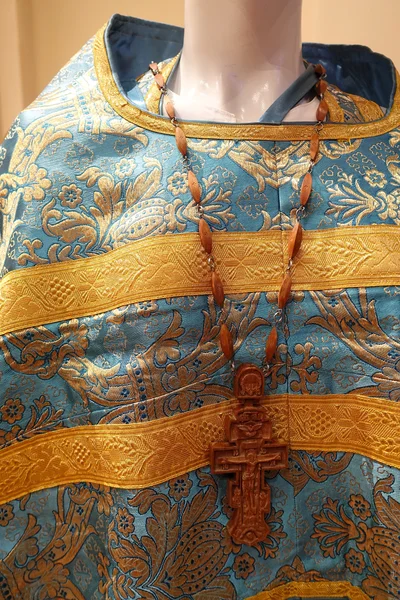 A wooden cross worn over the phelonion, as it is seen at a service