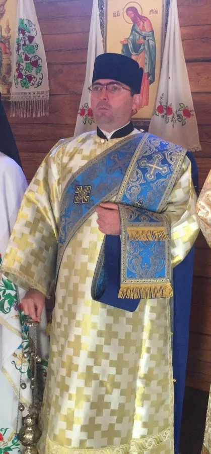 The double orarion: the band from the left shoulder crosses the right side and rises back to the shoulder. Ukraine, 2018