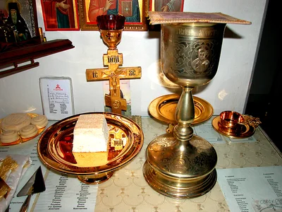The prepared gifts: the Lamb on the diskos, the chalice, the spear and the commemoration lists. Düsseldorf, 2010