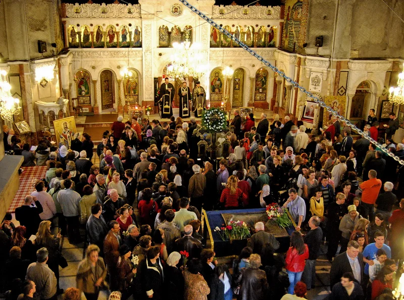 A church packed with worshippers at the Great Friday service, Bucharest, 2009