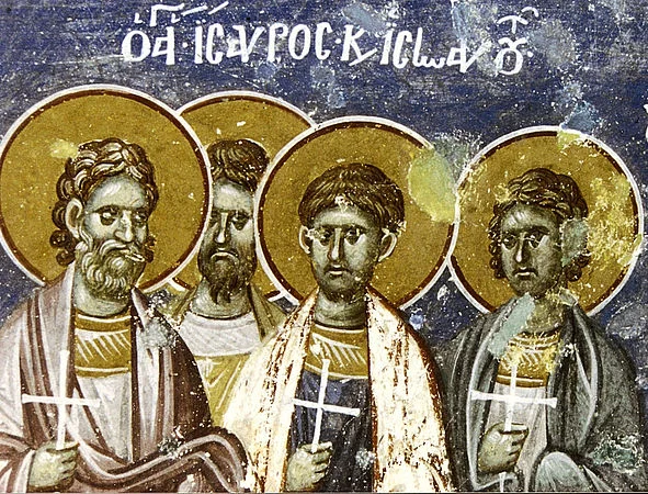 Фреска (монастырь Водоча, Македония, 1-я пол. XI в.) с надписью «ΟΙ ΑΓΙΟΙ ΙCΑΥΡΟC ΚΑΙ...» — группа из четырёх мучеников, диакон Исавр в числе изображённых